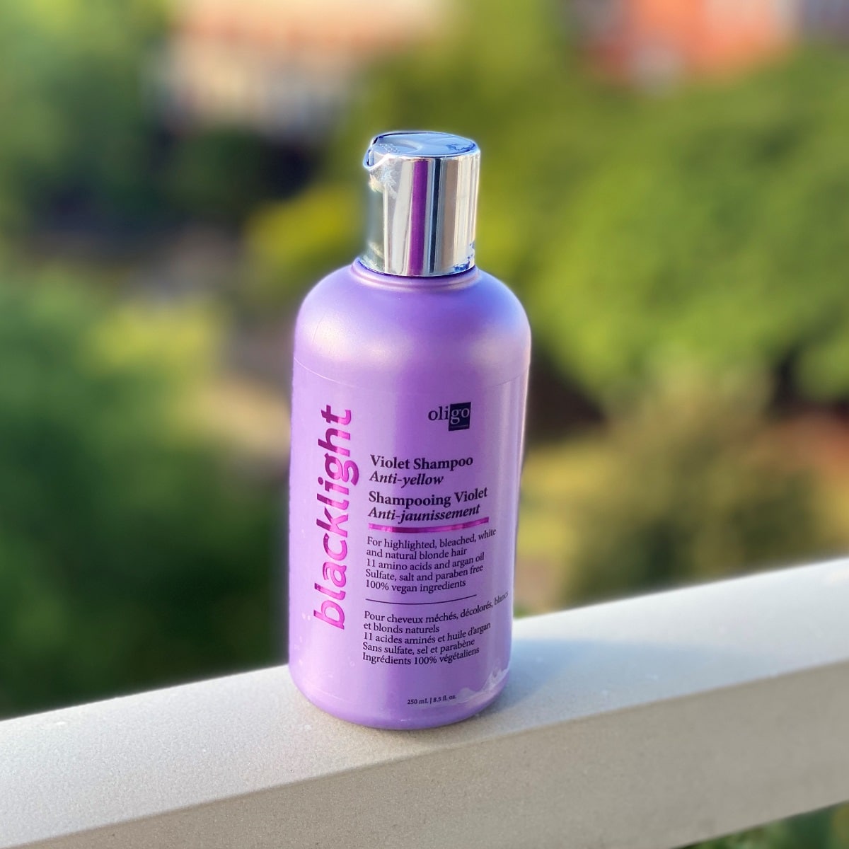 Oligo Professional Blacklight Violet Shampoo is the best purple shampoo for blondes to get rid of yellow and orange undertones