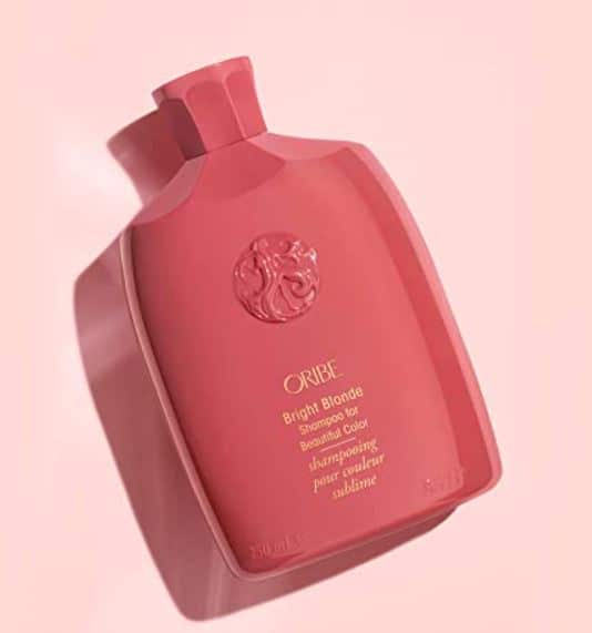 Oribe Bright Blonde Shampoo for Beautiful Color is a purple shampoo for platinum hair and one of the best purple shampoos for blonde hair along with Oligo Blacklight violet shampoo