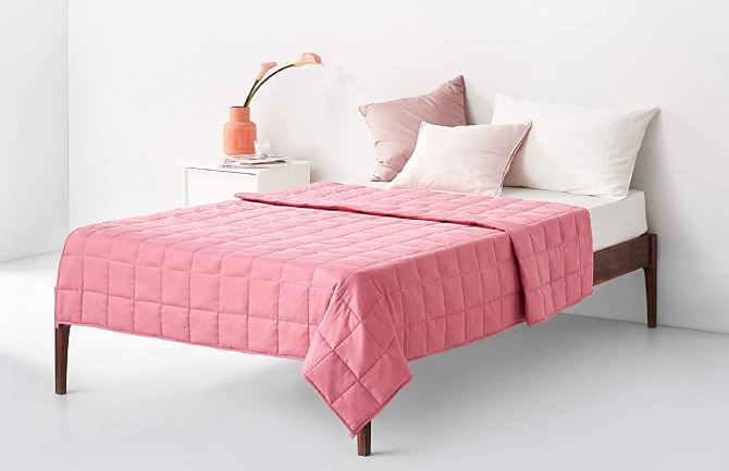 pink weighted blanket for her to add to a college care package and freshman dorm decoration gift
