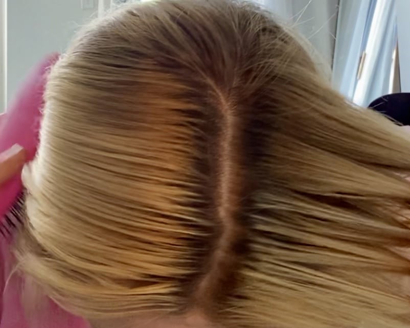 Before Wella T28 pictures - dark roots on a blonde woman