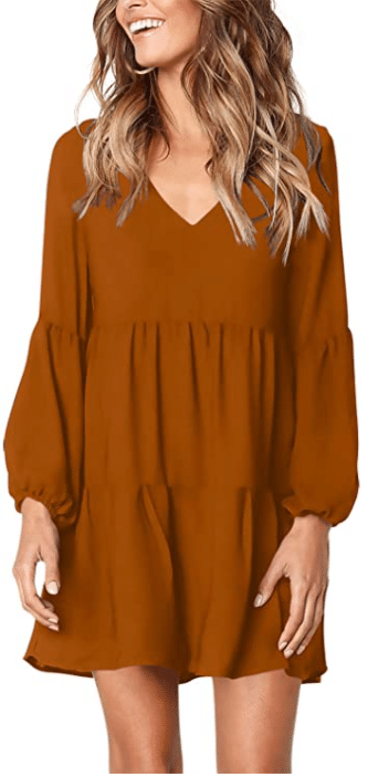 flowy tunic dress in orange and brown for plus size fall engagement photo shoot idea
