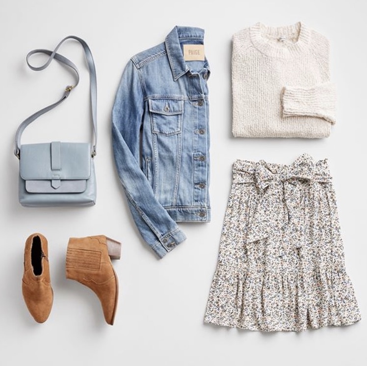 Stitch Fix fall outfit ideas and fall outfit picture to buy online from Amazon with short ruffled skirt, cream sweater, jean jacket, brown booties, light blue purse by Very Easy Makeup