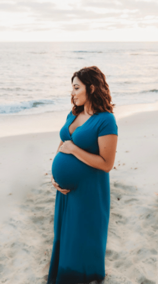 casual dark blue or navy maternity photo shoot dress for the beach