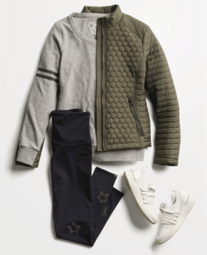 Stitch Fix fall 2020 outfit with puffy green jacket, gray sweater, and tights with stars