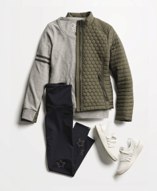 Stitch Fix fall 2020 outfit with puffy green jacket, gray sweater, and tights with stars