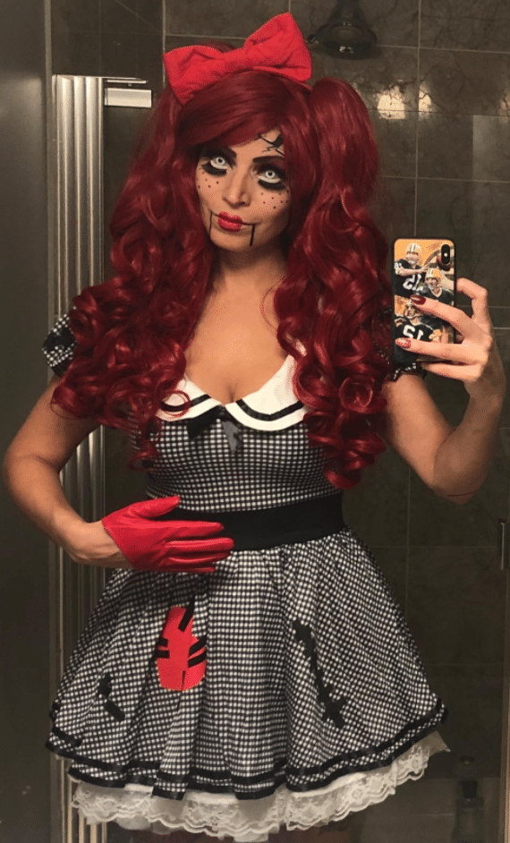 scary wind me up doll adult costume for Halloween to wear with a COVID face mask