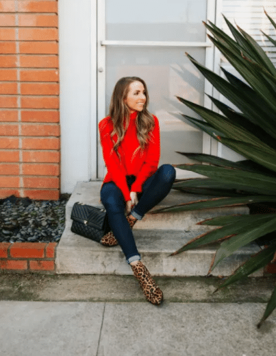 Christmas Outfit with Jeans, Red Sweater, and Leopard Print Boots