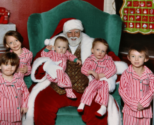 Matching Red and White Striped Pajamas for Photo with Santa