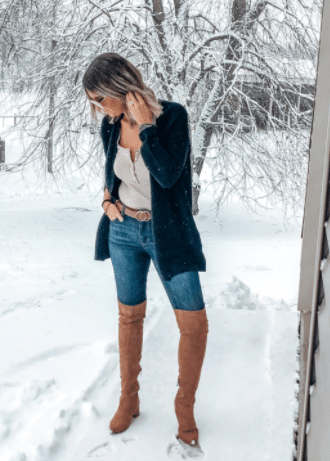 fall outfit idea with over the knee leather brown boots, jeans, and sweater