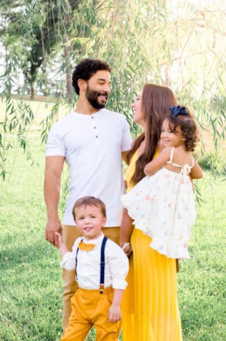 summer family photo with hispanic couple in yellow and white outfits