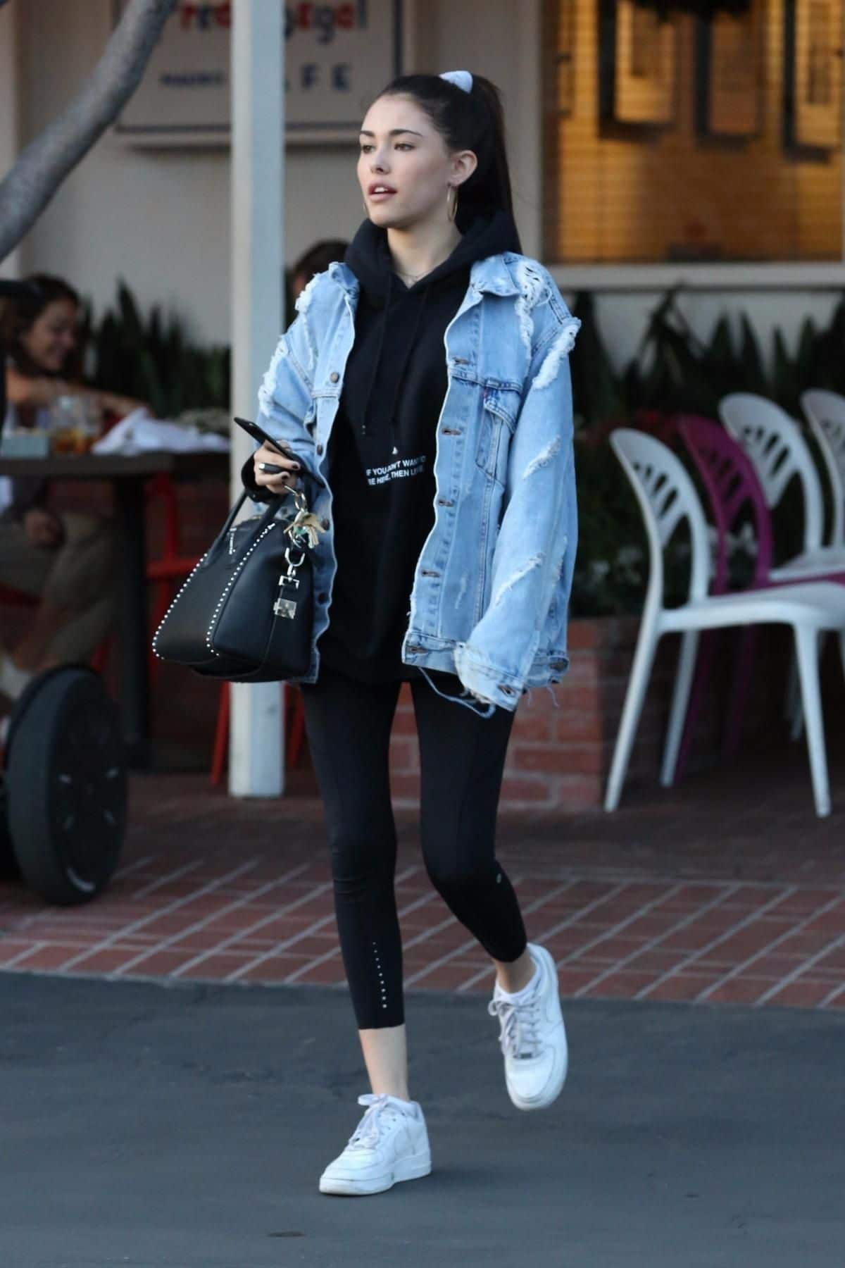 Madison Beer in Nike Air Force 1 outfit with jean jacket