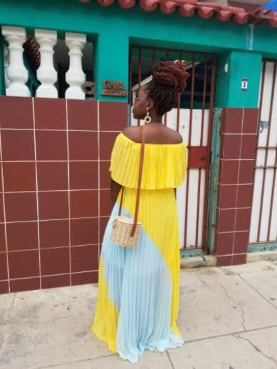Yellow and Blue Pleated Dress on Black Woman for Cuba Vacation Outfit