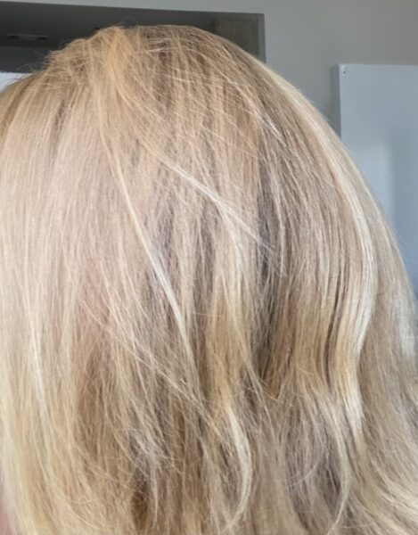 before pic of blonde with brassy and orange hair before using Oligo blacklight violet shampoo