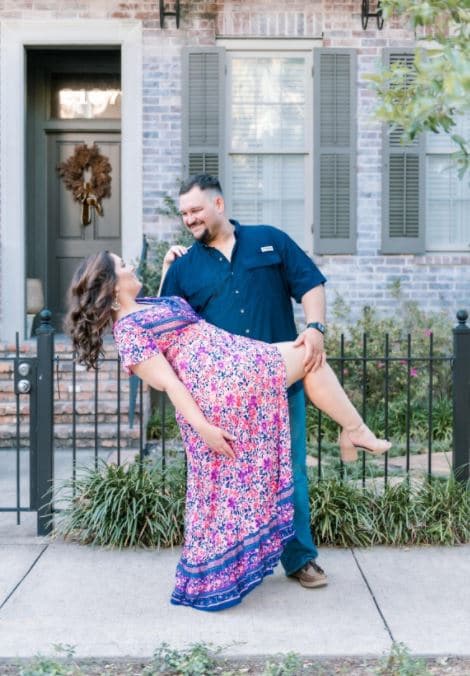 casual summer engagement photoshoot with maxi dress outfit and man in jeans
