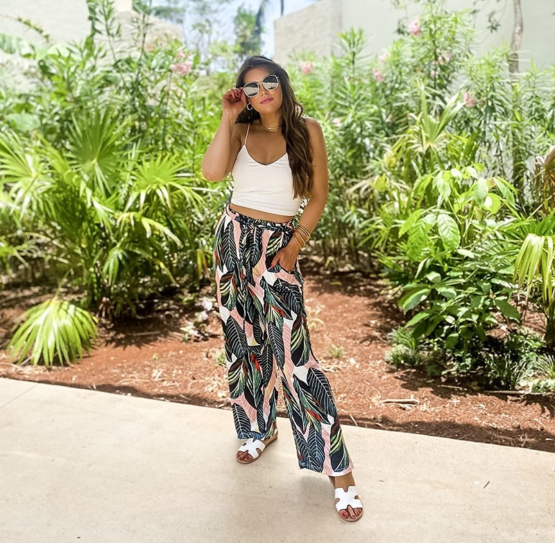 tropical beach vacation outfit idea with palm leaf beach pants