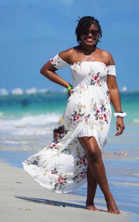 white off the shoulder dress on black woman for beach vacation outfit