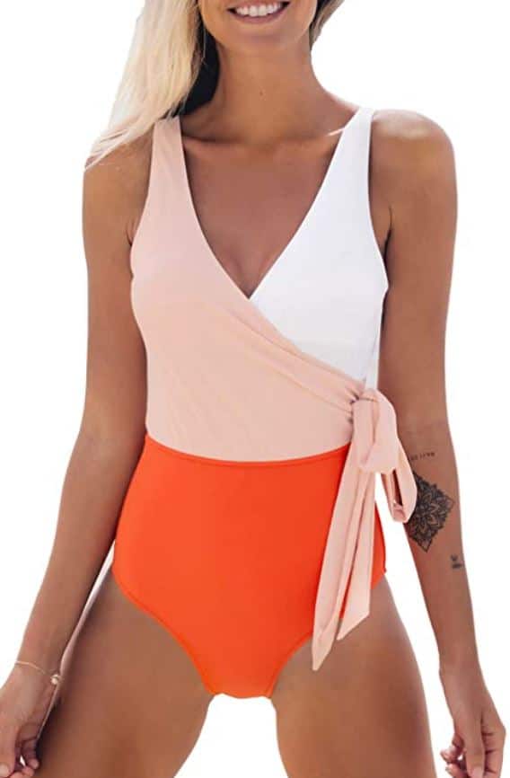 CUPSHE one piece swimsuit for juniors in color block with orange, peach, and white