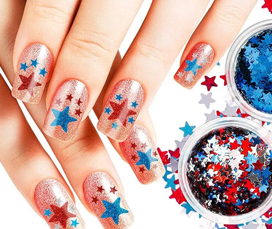 4th of July nails ideas and nail decals with stars, glitter, and sequins