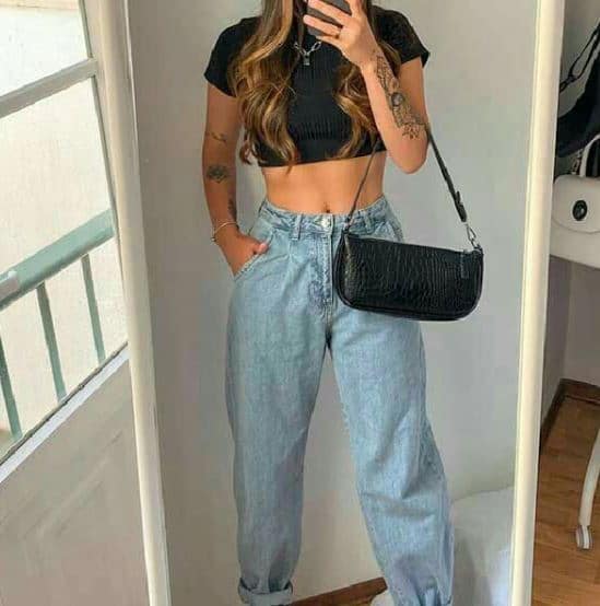 baddie outfit with jeans and crop top