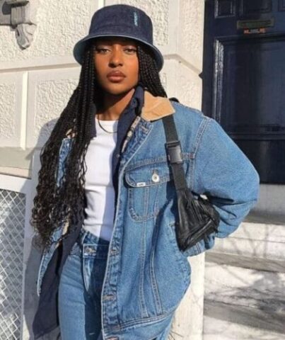 baddie outfit with jean jacket and jeans and bucket hat