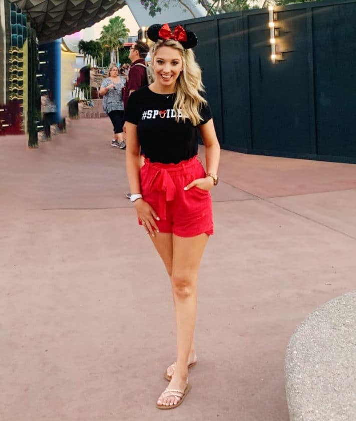 cute Epcot outfit idea with red shorts and Disney t-shirt