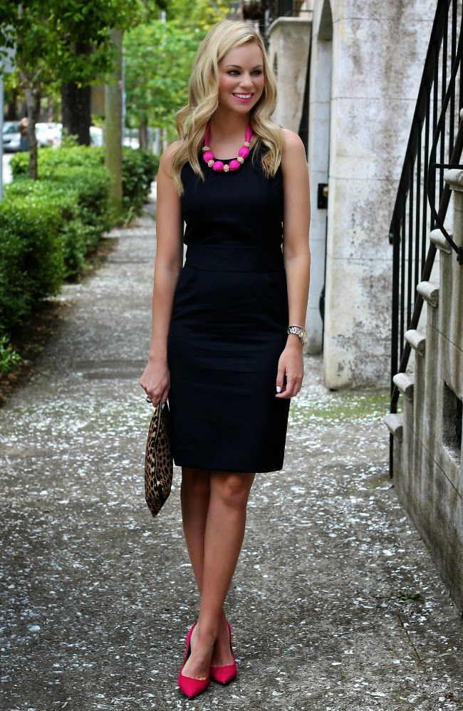 woman in black dress and bright heels for fall date night outfit