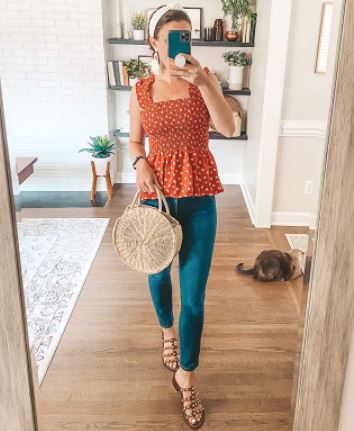 fall outfit with orange tank top and jeans