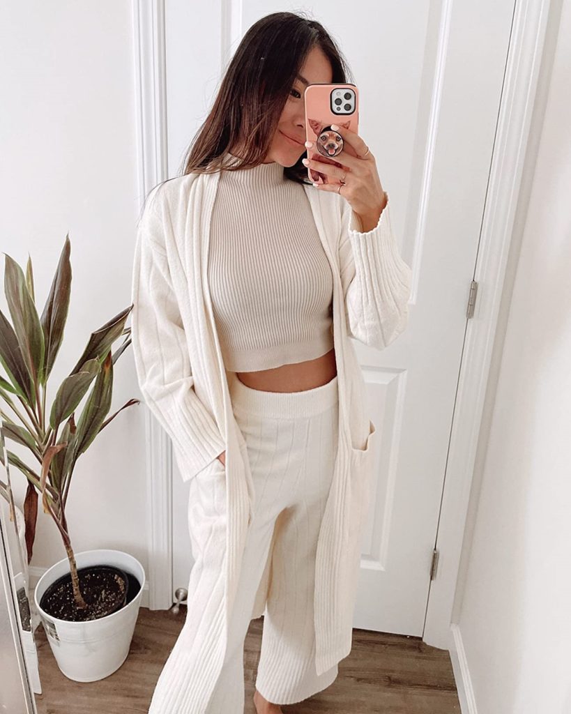 cozy white and cream loungewear outfit with white pants, cardigan, and cream crop top