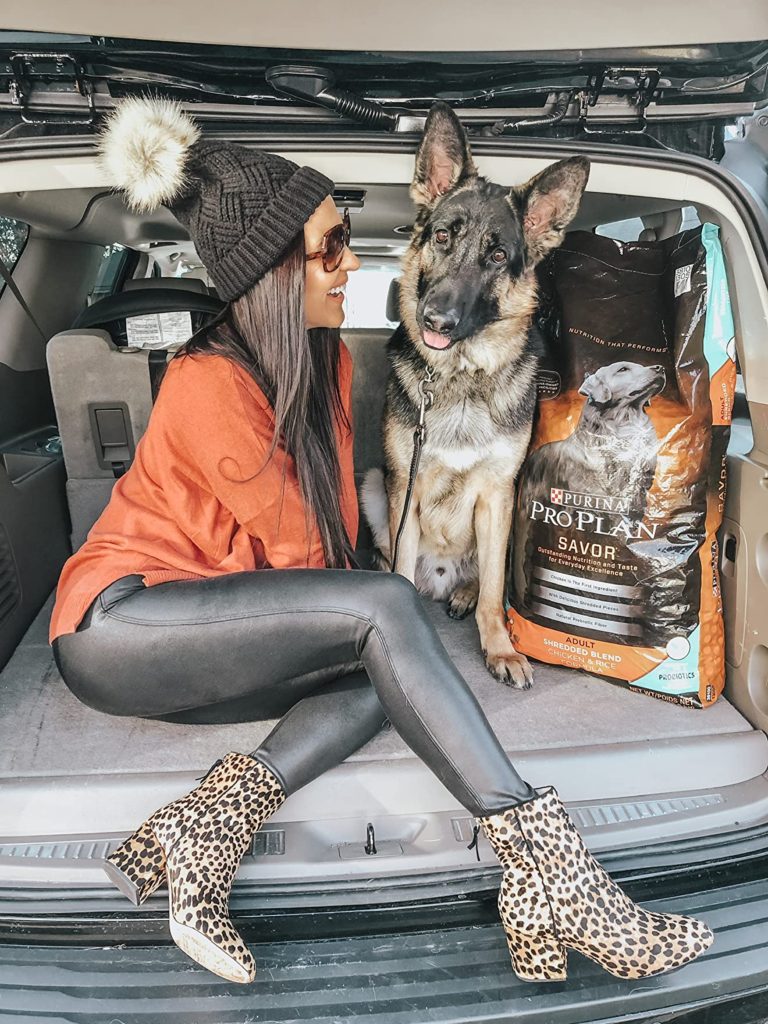 cute fall and winter outfit idea with black leggings, leopard booties, and beanie hat