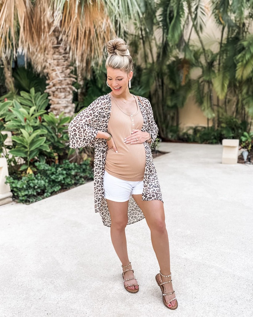 cute summer maternity outfit with white shorts and leopard cardigan on Amazon