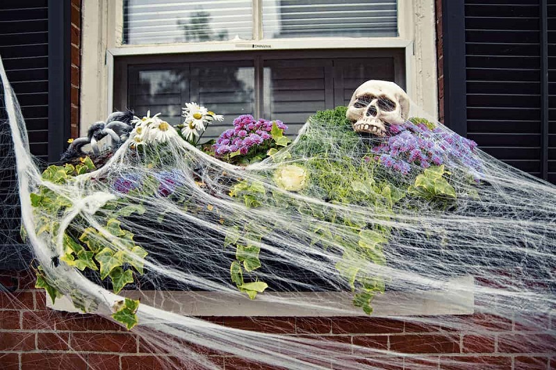 apartment decorated with spider webs for easy Halloween decor for apartments