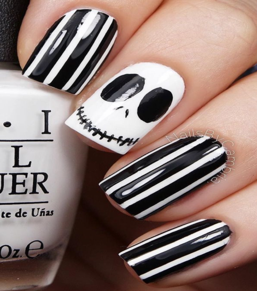 black and white Halloween nails with stripes