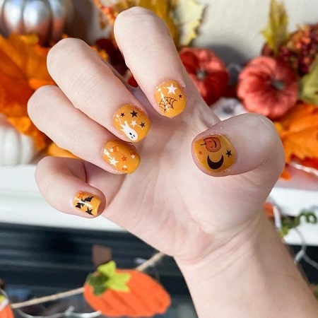 Orange Halloween Nails with Ghosts