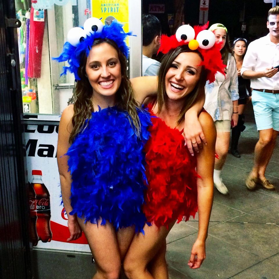 teenage girl Halloween costumes with two girls dressed up as Elmo and Cookie Monster