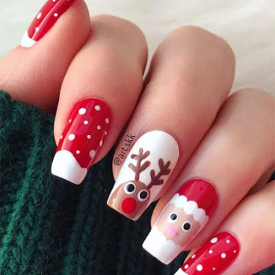 Christmas winter nails with reindeer and Santa Claus