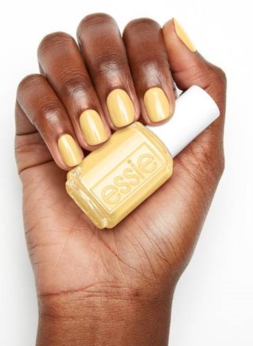 essie All Fun and Games yellow nail polish on dark skin for fall with essie Ferris of Them All