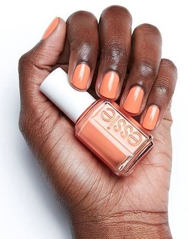 essie fall nail color in orange on dark skin with essie Souq Up the Sun