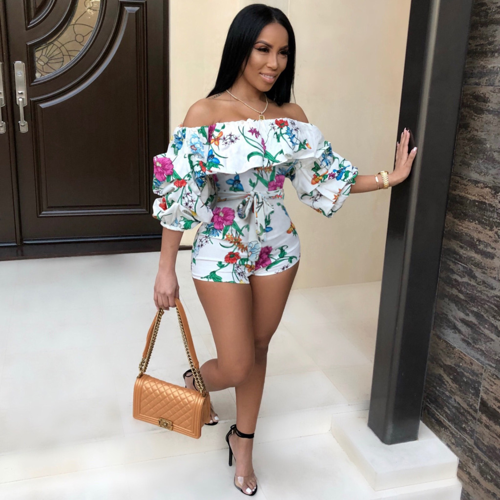 white floral off the shoulder romper on black woman for vacation outfit