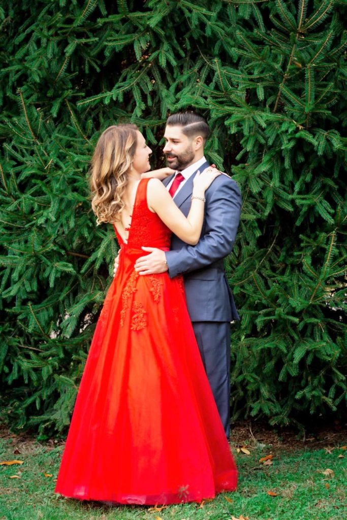 Winter Engagement Photo Outfit with Red Lace Dress