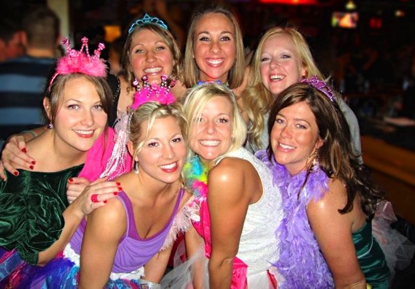 80s Bachelorette Party Outfits with Pink and Purple Boas