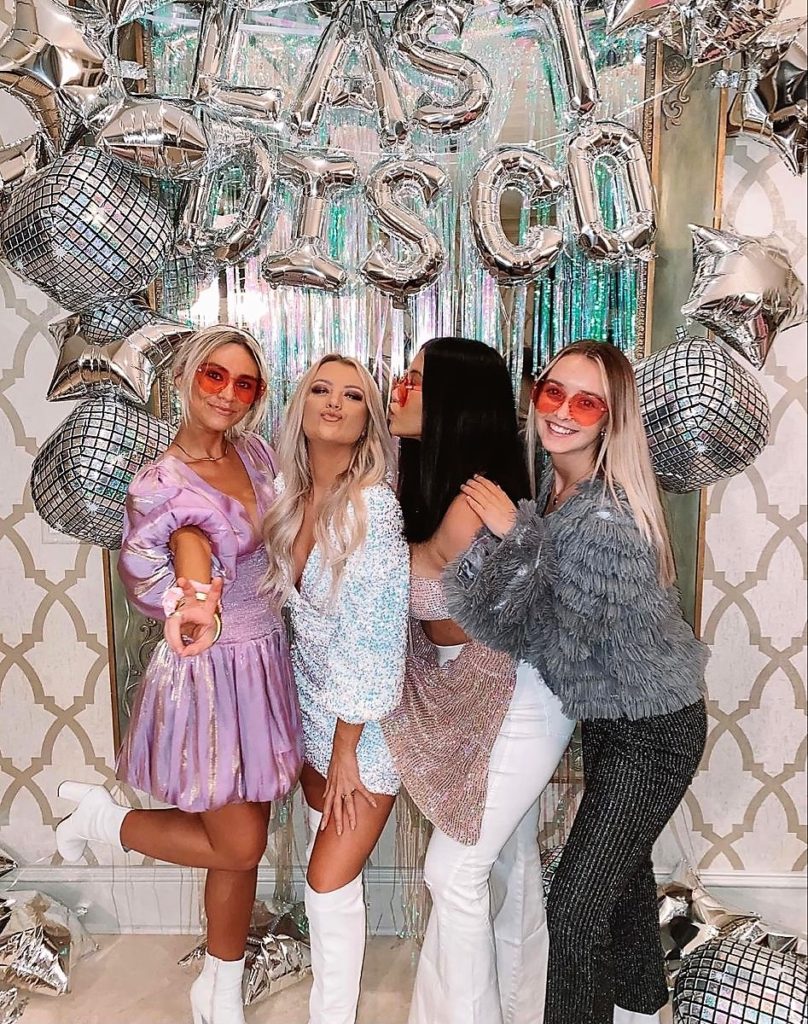 Disco Bachelorette Party Outfits with White, Silver, and Pink Sequin Dresses