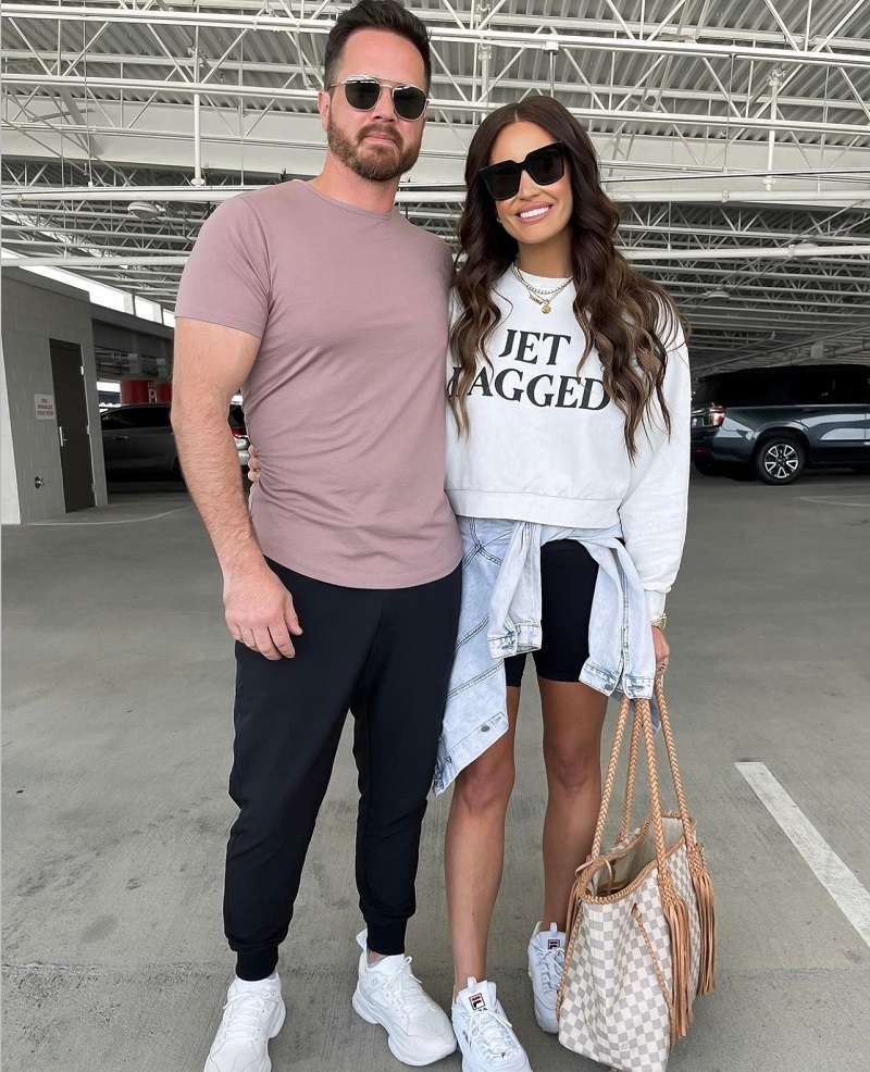 Cute Casual Travel Outfit with Biker Shorts and Jet Lagged Sweater