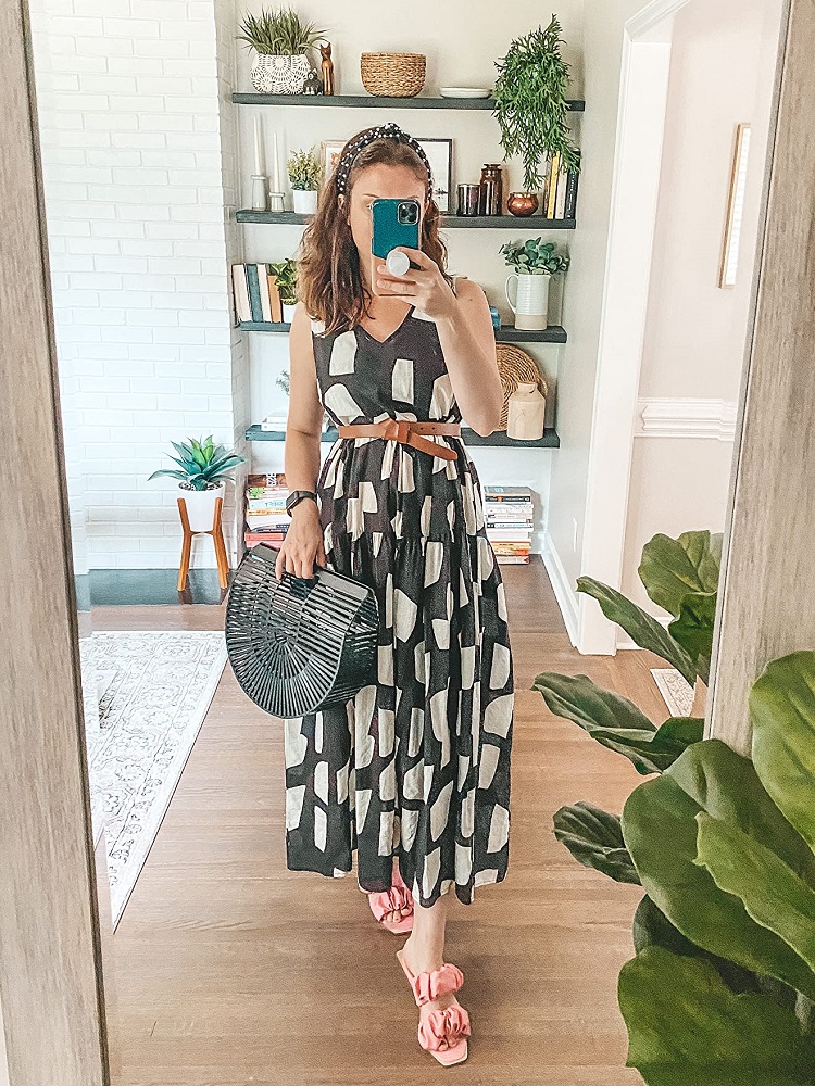 cute summer outfit with black and white dress and rattan bag