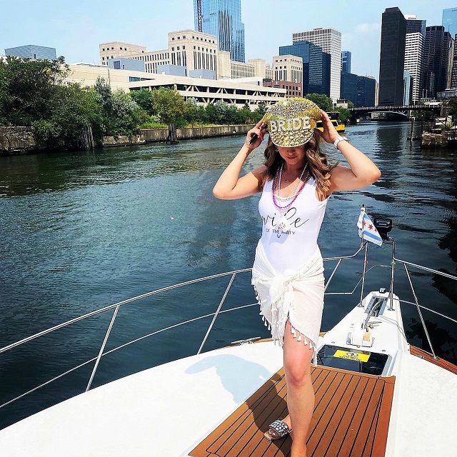 Bachelorette Boat Party Idea with Gold Captain and Sailor Hat for Bride