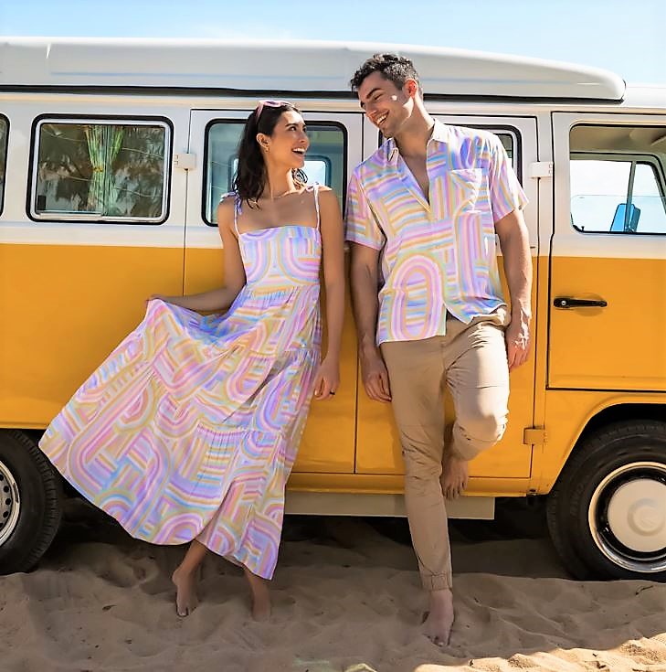 Matching Vacation Outfits for Couples with Pastel Colored Dress and Collared Shirt in Light Blue, Pink, and Yellow