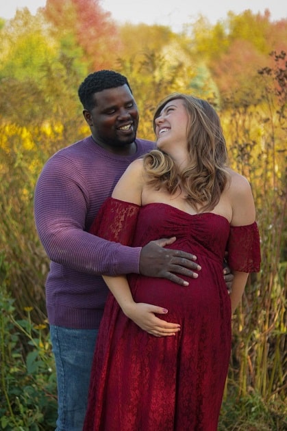 Couple Maternity Photoshoot Idea Smiling