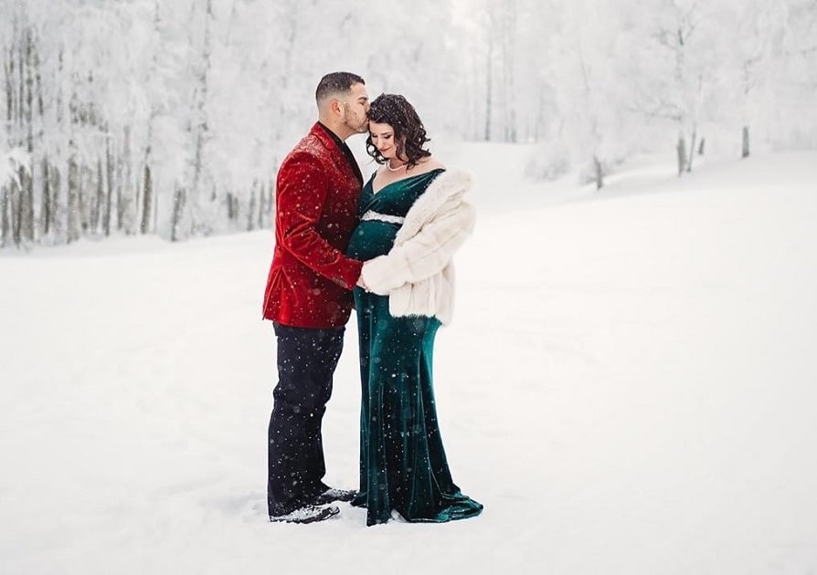 Couples Christmas Maternity Photos in Green and Red