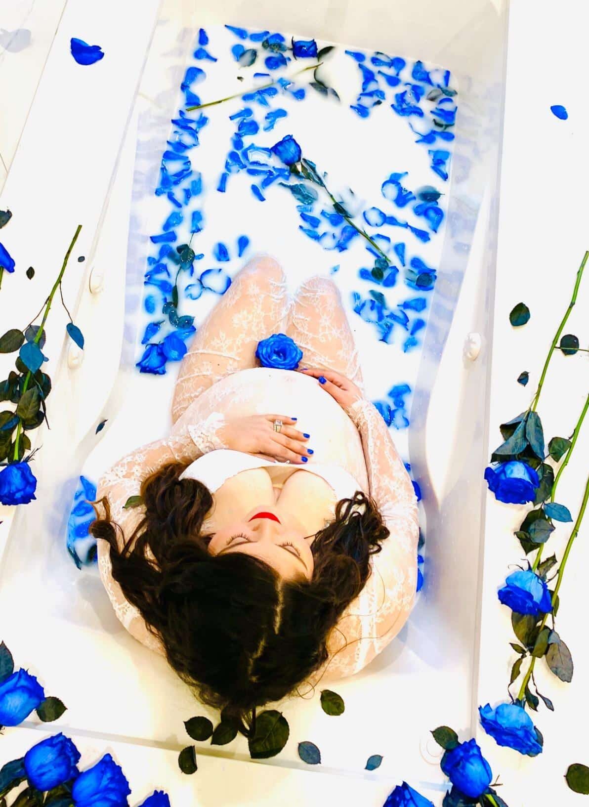 Maternity Milk Bath Photoshoot with Blue Flowers