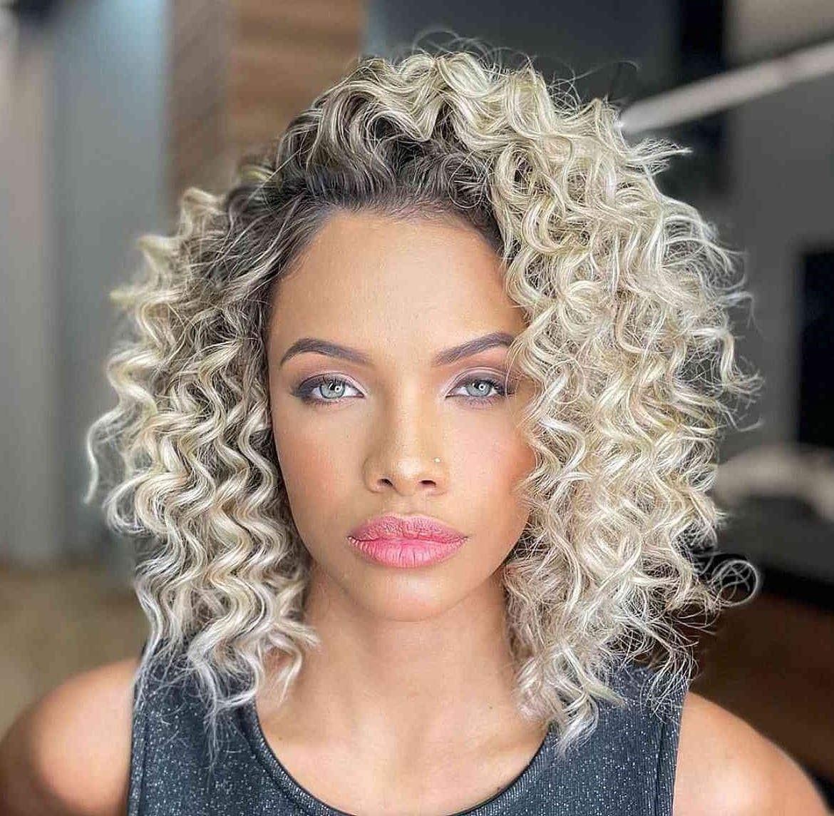 black and blonde curly hair on black woman