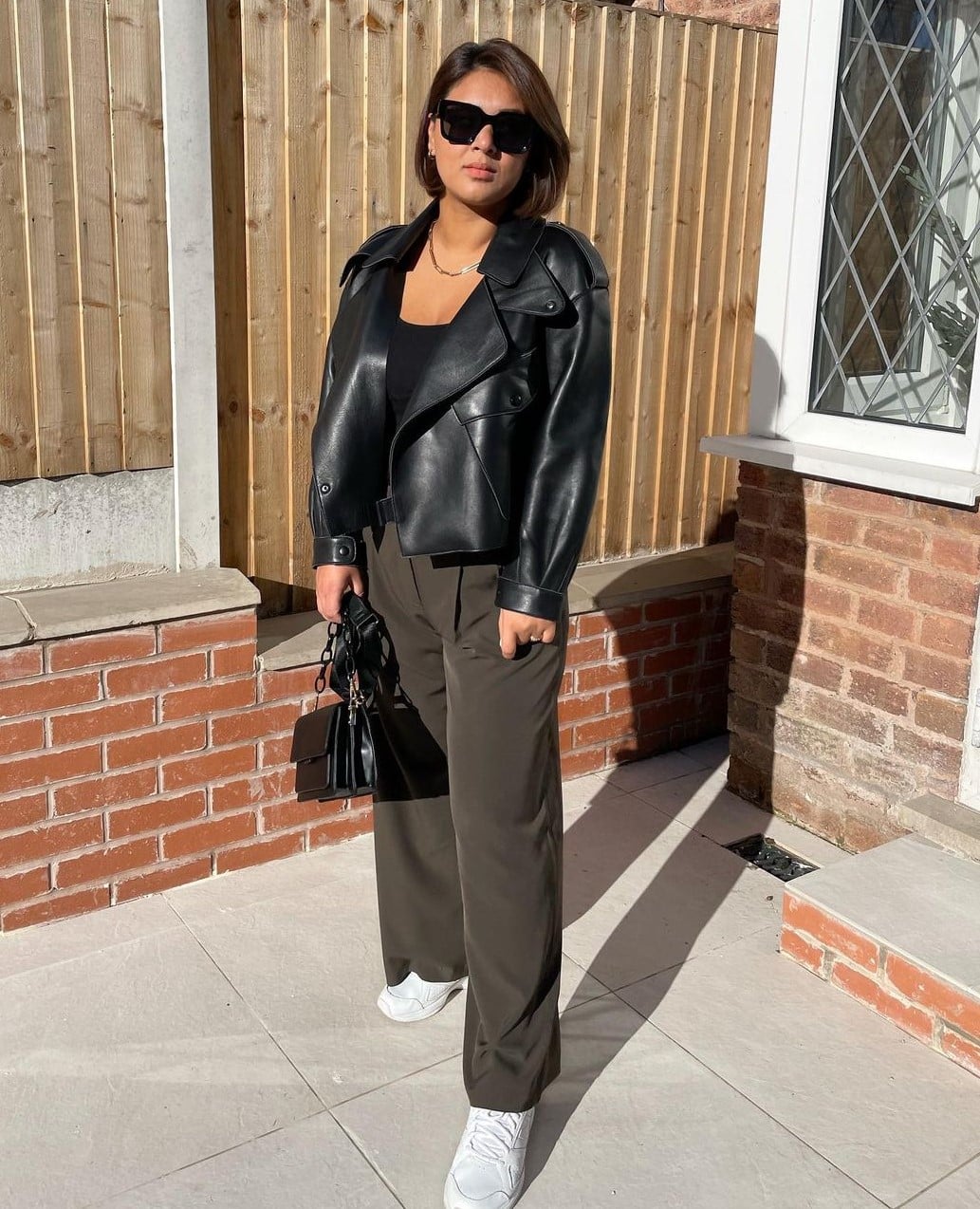 Black Leather Jacket Outfit with Trouser Pants